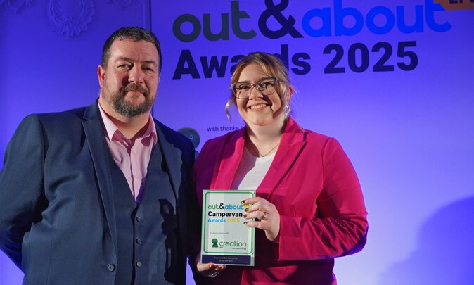 Press Picture | Iand Duff and Emma Hughes with the Out & About Live Campervan Award for the ERIBA Car