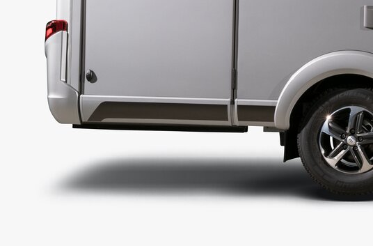 Autocaravan HYMER visuale laterale della parte posteriore con luci posteriori, garage e ruota posteriore
