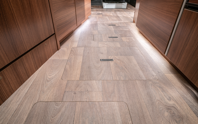 Living area floor with cellar compartments in the double floor in the HYMER motorhome