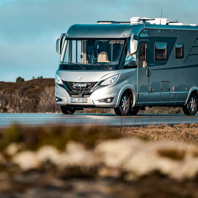 Mercedes based HYMER B-Class MasterLine on the road in the middle of a Scandinavian landscape