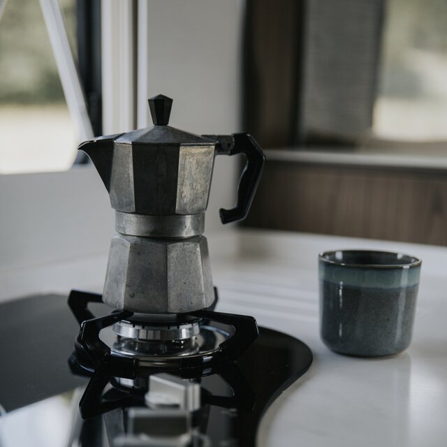 Espresso maker on the gas stove of a mobile home