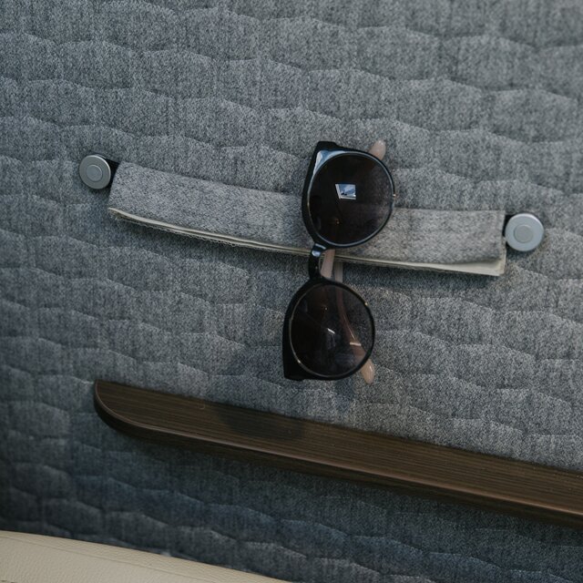 Storage option for accessories on the fabric-covered interior wall of the mobile home