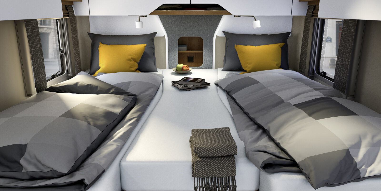 Lengthways single beds with gray checked bed linen, yellow decorative pillows and central additional cushion in the rear of the HYMER B-ML I