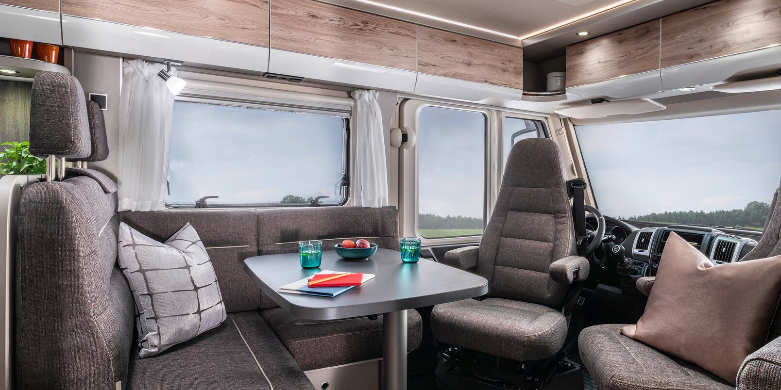 Lounge seating group with driver's seats in the HYMER Exsis-i motorhome