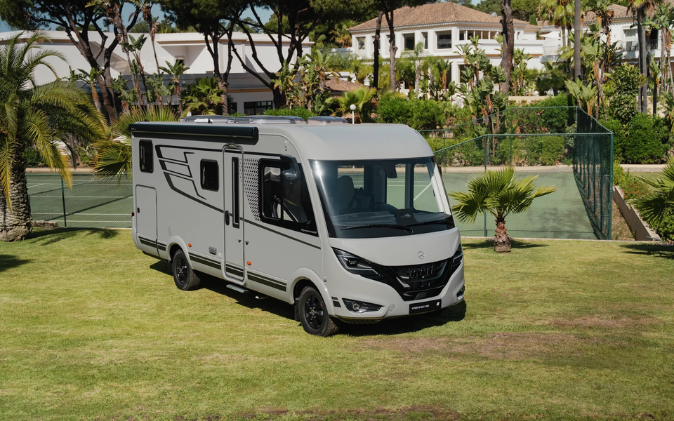 Hymer B‑MC I in a striking three‑quarter front view with redesigned front, panoramic windscreen and premium integrated motorhome design
