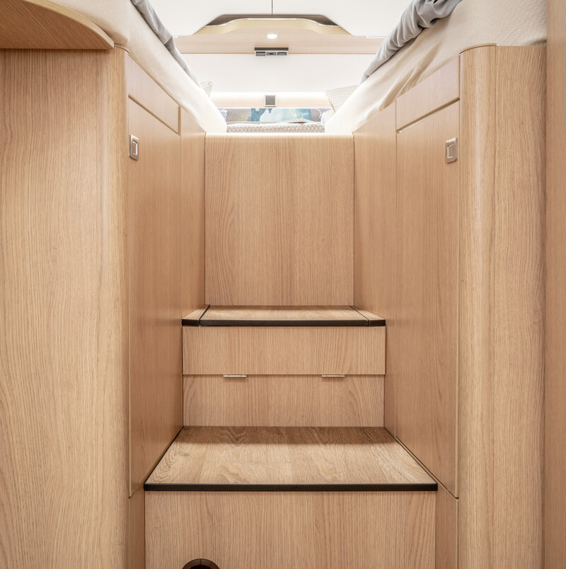 Steps in the center for access to the twin beds in the rear of the HYMER B MC