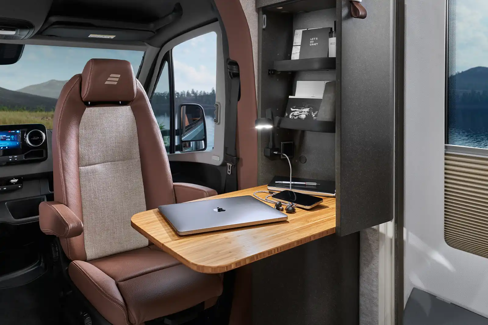 The view of the flipped passenger seat of the HYMER Venture S, which also serves as an office chair.
