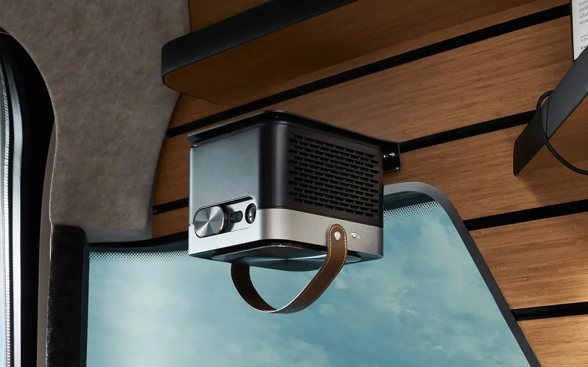A handy projector is mounted on the multifunction wall in the Magic Diner of the HYMER Venture S.